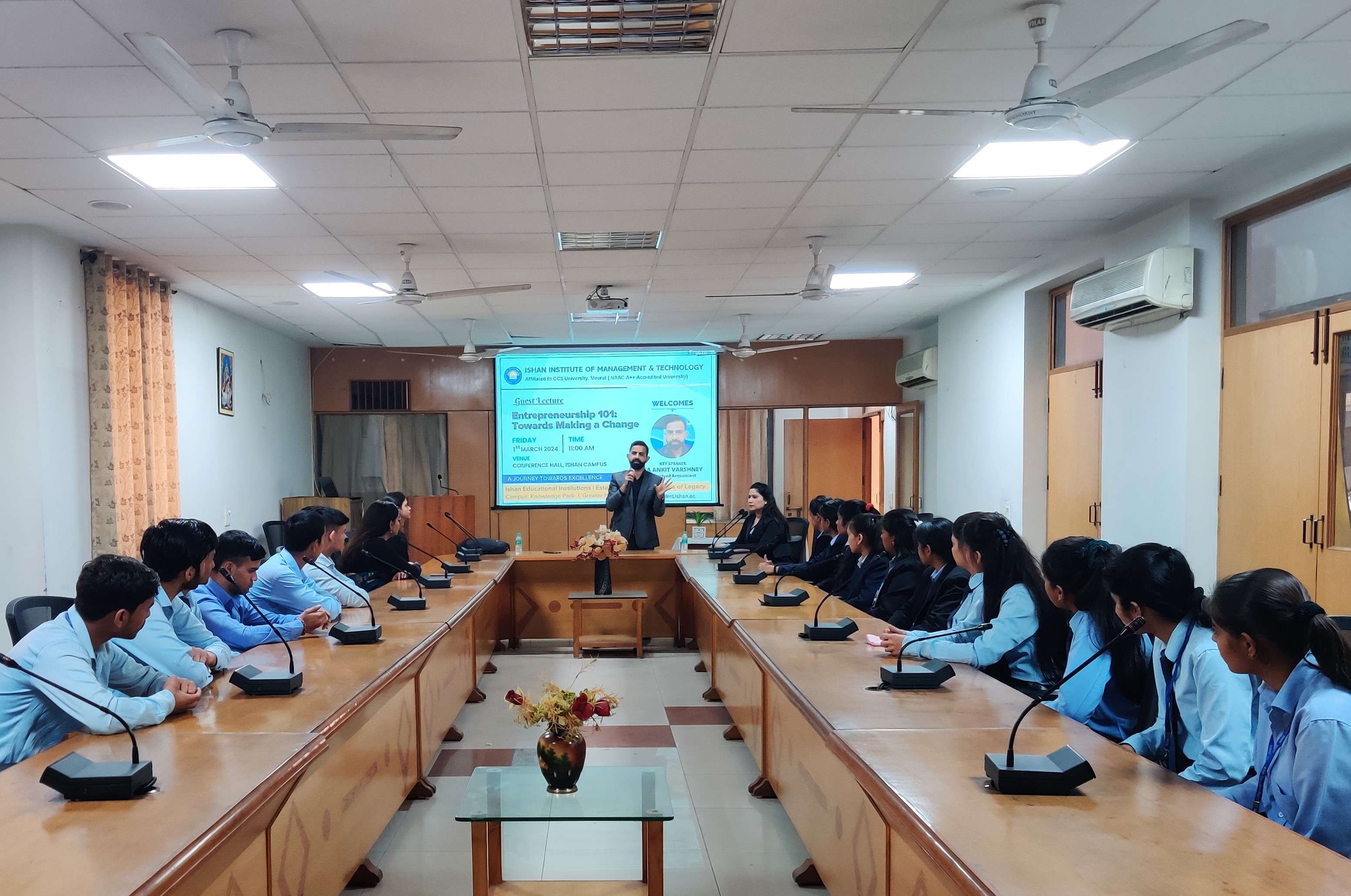 BBA students participating in debate competition at Ishan IIMT.